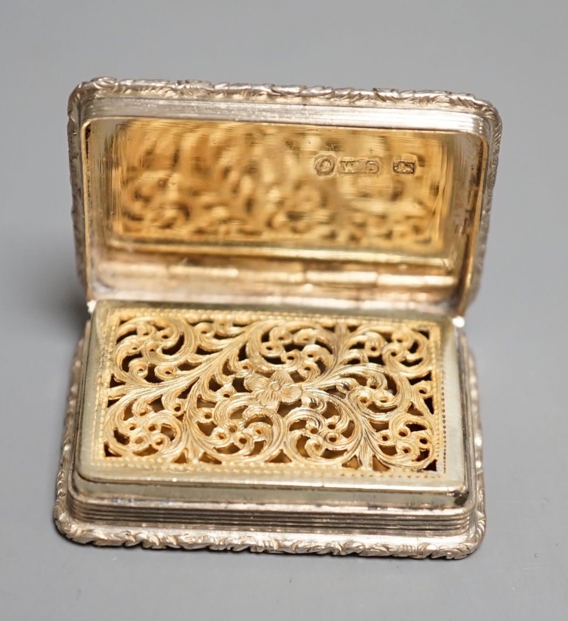 A George IV engine turned silver rectangular vinaigrette, William Simpson, Birmingham, 1827, 38mm.